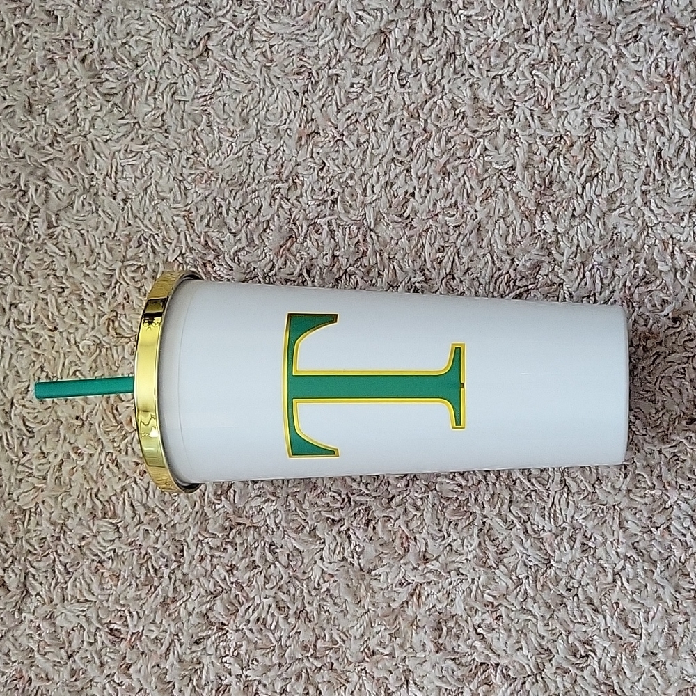 Cup with lid and straw